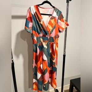 V-neck women's dress. Purchased from Shein. Sz XL. Never worn.